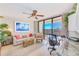 Cozy living room with a comfortable sofa, stylish decor, and a stunning view from the balcony at 3820 Gulf Blvd # 802, St Pete Beach, FL 33706