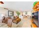 Open living area featuring tile floors, comfortable seating, and tasteful decor at 3820 Gulf Blvd # 802, St Pete Beach, FL 33706