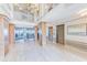 An elegant lobby featuring high ceilings, tile flooring, elevator access, and balcony with outdoor views at 3820 Gulf Blvd # 802, St Pete Beach, FL 33706