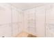 Spacious walk-in closet with custom shelving and ample storage space; ideal for organization at 3820 Gulf Blvd # 802, St Pete Beach, FL 33706