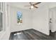 Bright bedroom featuring vinyl plank flooring and a window at 4082 38Th N Ave, St Petersburg, FL 33713