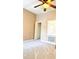 Bedroom featuring a neutral color scheme, gray carpeting, and standard closet at 4133 Bismarck Palm Dr, Tampa, FL 33610