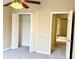 Bedroom showcasing an open closet, gray carpet, and neutral walls at 4133 Bismarck Palm Dr, Tampa, FL 33610