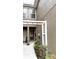 Charming townhouse exterior with well-maintained landscaping and stucco walls at 4133 Bismarck Palm Dr, Tampa, FL 33610