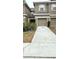Charming townhouse exterior with well-maintained landscaping at 4133 Bismarck Palm Dr, Tampa, FL 33610