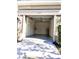 Open garage showcasing concrete floor, overhead lighting, and wire shelving at 4133 Bismarck Palm Dr, Tampa, FL 33610