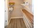Walk-in storage space with new laminate flooring and new shelves, offering ample room at 4402 Ohio Ave, Tampa, FL 33616