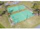 Aerial view of the community basketball courts, offering recreational opportunities and activity at 4915 Churchill Pl, Land O Lakes, FL 34639