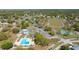 Community amenities including a pool, tennis courts, running track, and community center at 4915 Churchill Pl, Land O Lakes, FL 34639