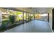 Enjoy the outdoors from this screened patio, overlooking a beautifully landscaped yard at 4915 Churchill Pl, Land O Lakes, FL 34639