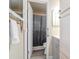 Bathroom featuring a modern vanity, tub-shower combo, with access to the hallway and linen closet at 5100 Burchette Rd # 500, Tampa, FL 33647