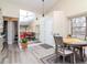 Open-concept home entryway with views of the dining area and living room at 5100 Burchette Rd # 500, Tampa, FL 33647
