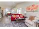 Spacious living room with a decorative mirror, comfortable seating, and bright accents at 5100 Burchette Rd # 500, Tampa, FL 33647