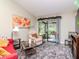 Comfortable seating area with natural light and access to the screened patio at 5100 Burchette Rd # 500, Tampa, FL 33647