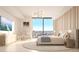 Elegant bedroom with stylish decor and expansive windows showcasing breathtaking city vistas at 520 N Tampa St # 1906, Tampa, FL 33602