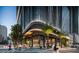 Street-level view of the building featuring an upscale restaurant with outdoor seating at 520 N Tampa St # 1906, Tampa, FL 33602
