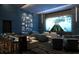 Comfortable movie theater room with tiered seating and bar, ideal for watching films at 520 N Tampa St # 1906, Tampa, FL 33602