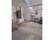 Unfinished garage with space for storage at 5261 Camberlea Ave, Zephyrhills, FL 33541