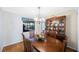 Comfortable dining room featuring a wood table, chairs, and china cabinet at 5938 Oakhurst Dr, Seminole, FL 33772