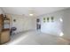 Spacious open-concept living area with access to the kitchenette, enhancing comfort at 5938 Oakhurst Dr, Seminole, FL 33772