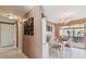Charming dining area featuring a cozy table setting with rustic decor, perfect for intimate gatherings at 6712 Runningwoods Dr, Tampa, FL 33634