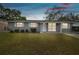 Charming single-story home with well-maintained lawn and exterior, creating a welcoming ambiance at 6712 Runningwoods Dr, Tampa, FL 33634