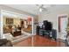 Spacious living room showcasing an open floor plan, with hardwood flooring and comfortable seating arrangement at 6712 Runningwoods Dr, Tampa, FL 33634
