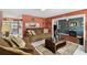 Cozy living room featuring a comfortable sofa, a coffee table, and an open layout at 6712 Runningwoods Dr, Tampa, FL 33634