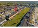 An aerial view of townhomes with well-maintained lawns and convenient parking spaces at 7047 Towne Lake Rd, Riverview, FL 33578