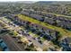 Aerial view of the neighborhood with well-kept lawns and mature trees along the streets at 7047 Towne Lake Rd, Riverview, FL 33578