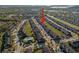Community aerial view showing community pool, landscaping and ample parking at 7047 Towne Lake Rd, Riverview, FL 33578