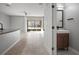 Open-concept living area flows to the screened lanai, adjacent to a modern bathroom at 7047 Towne Lake Rd, Riverview, FL 33578