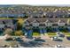Street view of townhomes featuring attached garages, driveways, and landscaped yards at 7047 Towne Lake Rd, Riverview, FL 33578