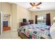 Bedroom with a view to the pool and featuring a ceiling fan, and tiled flooring at 7116 Colony Pointe Dr, Riverview, FL 33578