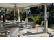 Covered outdoor patio space featuring outdoor dining and living area at 7126 Oelsner St, New Port Richey, FL 34652