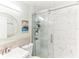 Modern bathroom with a marble tiled shower and a sleek sink at 766 86Th N Ave, St Petersburg, FL 33702