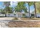 Charming single-story home with manicured lawn and inviting entryway at 766 86Th N Ave, St Petersburg, FL 33702