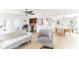 Open-concept living room flowing to dining and kitchen spaces with great natural light at 766 86Th N Ave, St Petersburg, FL 33702