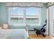 Water view from the bedroom, with a rowing machine for exercise and access to the balcony at 8040 Sailboat Key S Blvd # 402, St Pete Beach, FL 33707