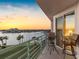Balcony view of the community's stunning waterfront views, perfect for relaxation or dining al fresco at 8040 Sailboat Key S Blvd # 402, St Pete Beach, FL 33707