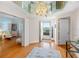 Elegant foyer showcasing hardwood floors and entry to adjacent rooms at 8040 Sailboat Key S Blvd # 402, St Pete Beach, FL 33707