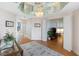 Spacious foyer with hardwood floors and views to the living areas at 8040 Sailboat Key S Blvd # 402, St Pete Beach, FL 33707