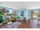 Bright lobby featuring tile floors, comfortable seating, and a large window with a view at 8040 Sailboat Key S Blvd # 402, St Pete Beach, FL 33707