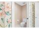 Toilet room with a classic design that complements the style of the main bathroom at 8040 Sailboat Key S Blvd # 402, St Pete Beach, FL 33707