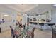 Bright and spacious open-concept kitchen featuring an island with bar stool seating at 807 Chipper Dr, Sun City Center, FL 33573