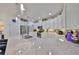 Spacious eat-in kitchen featuring stainless steel appliances, white cabinetry and generous countertop space at 807 Chipper Dr, Sun City Center, FL 33573