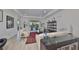 Spacious living room with sliding glass doors to outdoor patio at 807 Chipper Dr, Sun City Center, FL 33573