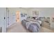 This spacious main bedroom features carpet and a connected bathroom at 807 Chipper Dr, Sun City Center, FL 33573