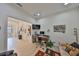 Open office space with desk, TV, and comfortable seating area at 807 Chipper Dr, Sun City Center, FL 33573