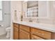 Bathroom showcasing a modern vanity, sink, and toilet at 834 Birdie Way, Apollo Beach, FL 33572
